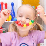 Child-with-beads Child with beads