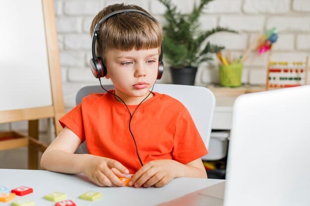 medium shot child wearing headphones